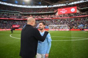 Bernardo Silva y Pep Guardiola